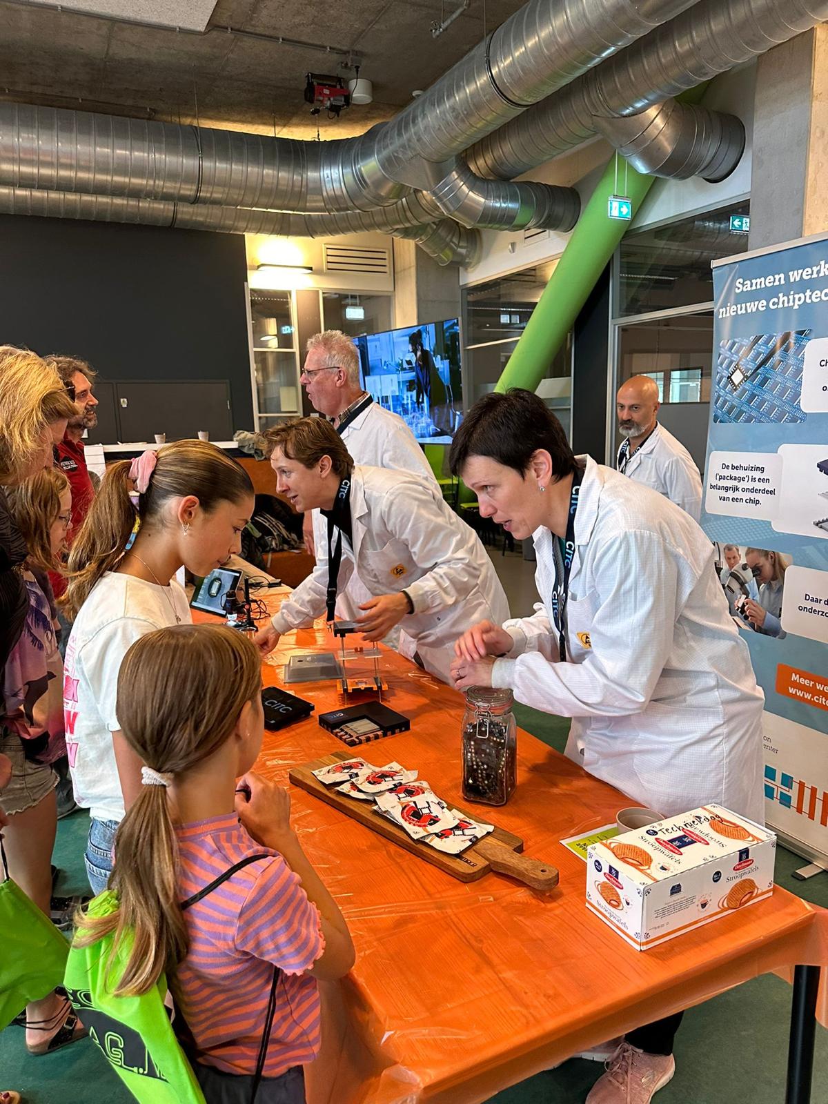 Children visiting a boot at an exhibition